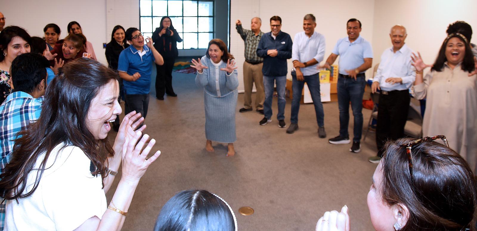 Laughter yoga group session in Dallas led by Suraiya